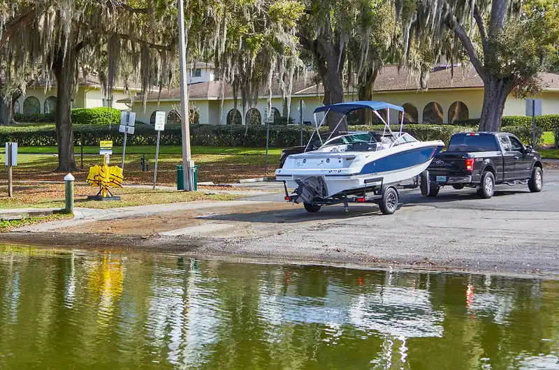 boat trailer leaving boat ramp